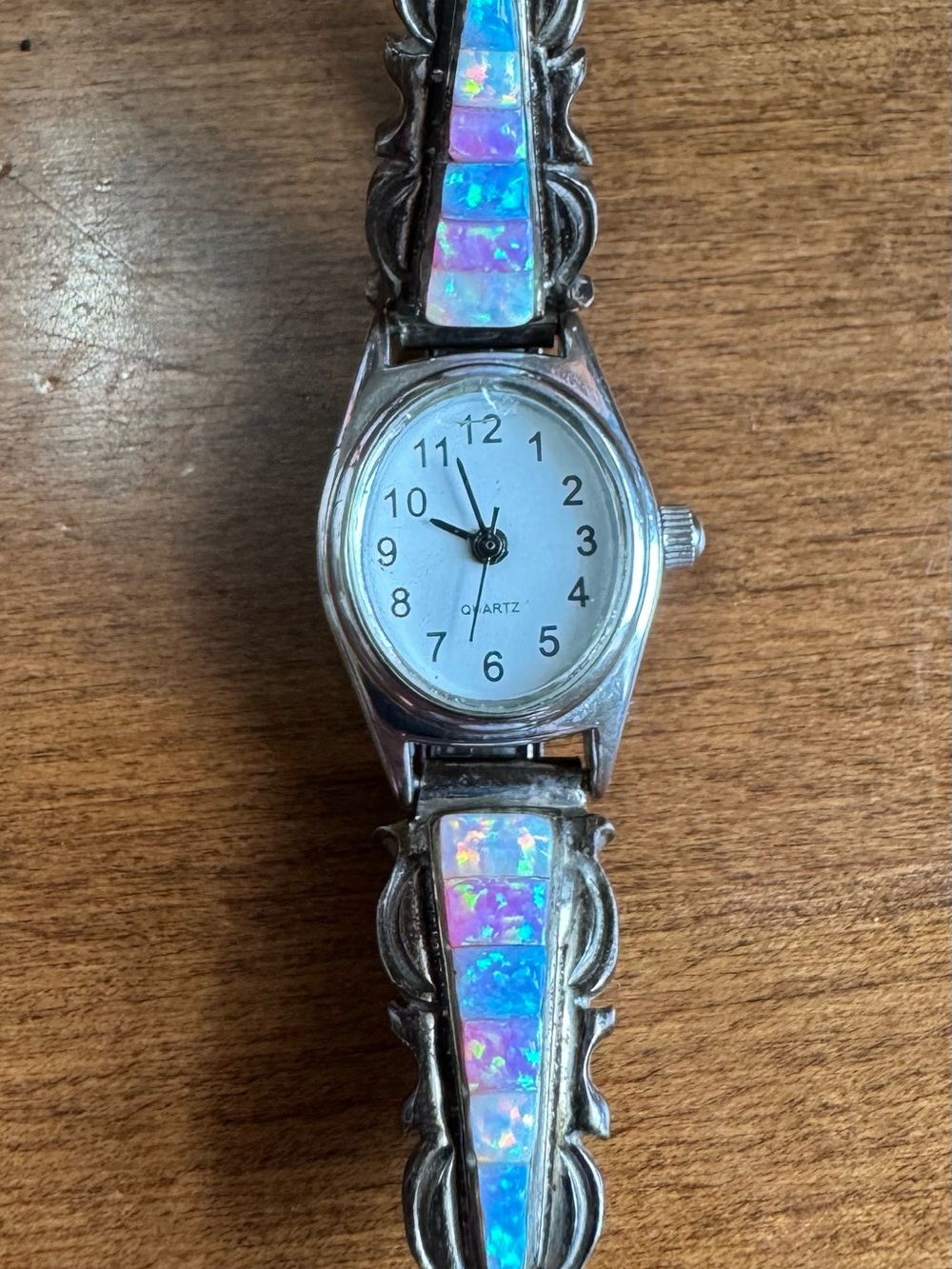 Sterling silver quartz watch by Gary Yazzie with channel inlay.